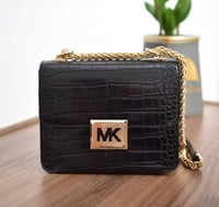 شنطة مايكل كورس