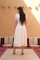 طقم تنورة وبلوزة وردي فاتح