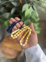 مسابح تراب الكهرمان شكة قماش