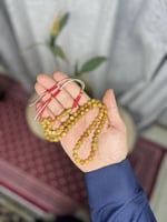 مسابح تراب الكهرمان شكة قماش