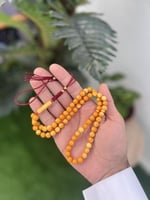 مسابح تراب الكهرمان شكة قماش