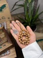 مسابح كوك طبيعي بطرابزونة فضة