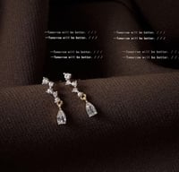 اقراط الندى