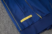 طقم تدريب شتوي ريال مدريد 2025-2026 كحلي سحاب كامل