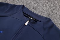 طقم تدريب شتوي برشلونة 2024-2025 كحلي سحاب طويل