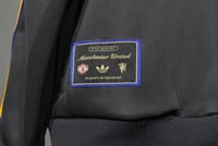 طقم جاكيت مانشستر يونايتد 2025-2026 اسود