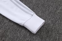 طقم تدريب شتوي ريال مدريد 2025-2026 ابيض سحاب كامل