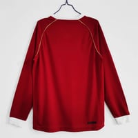 طقم مانشستر يونايتد موسم 2006-2007 احمر كم طويل