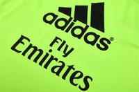 سويتر ريال مدريد اصفر