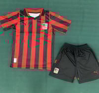 طقم ميلان بمناسبة 125 سنة اطفال