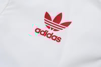 جاكيت مانشستر يونايتد 2024-2025 ابيض