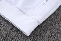 طقم تدريب شتوي نابولي 2025-2026 ابيض سحاب كامل