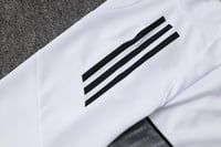 طقم تدريب شتوي ريال مدريد 2025-2026 ابيض سحاب كامل