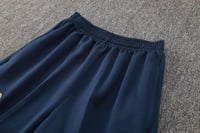 طقم تدريب شتوي برشلونة 2024-2025 احمر سحاب طويل