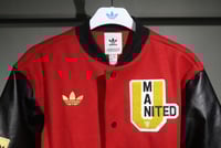 جاكيت مانشستر يونايتد 2025-2026 احمر