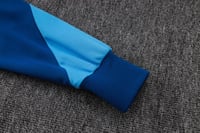 طقم تدريب شتوي برشلونة 2025-2026 سماوي سحاب طويل