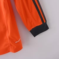 طقم ريال مدريد موسم 2013-2014 برتقالي كم طويل