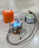 موقد التيربو مع قداح يعمل على دبات السنة وعلبة للح...