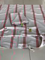 كيس عفش قماش مخطط مع عقدة ربط