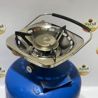 موقد تنزا يعمل على دبات الدافور الزرقاء بشعلة موزو...