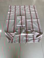 كيس عفش قماش مخطط مع عقدة ربط