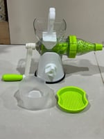 عصارة الفواكة اليدوية مع كأس مزود بشخال