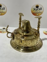 دافور نحاسي يعمل على القاز