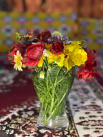 مزهرية زجاجية لجمع الزهور