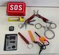 علبة الطوارئ SOS مع زرادية وصافرة وكشاف وقداح ومنش...