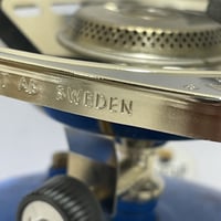 موقد تنزا يعمل على دبات الدافور الزرقاء بشعلة موزو...