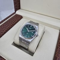 ساعة تيسوت رجالي فضي مع زيتي