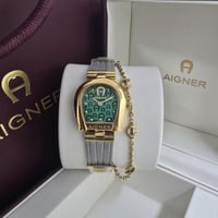 ساعه اقنر نسائي فضي مع ذهبي مينا زيتي كلاسيك