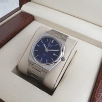 ساعة تيسوت رجالي فضي مع ازرق