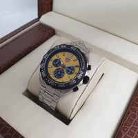 ساعة تاغ هوير فورمولا 1فضي مع اصفر