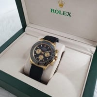 ساعه رولكس دايتونا كرونوغراف ربل اسود مع ذهبي - خي...