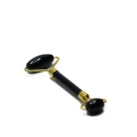 أداة تدليك الوجه من حجر البشم (رأسين ) مكونة من قط...