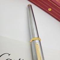 قلم كارتير سانتوس دومو فضي بذهبي غطاء