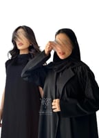 بكج عباية سوداء مطرزة بشك خرزي و فستان تحت العباية...