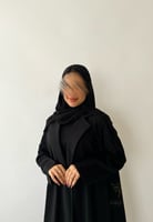 بكج عباية سوداء مطرزة بشك خرزي و فستان تحت العباية...
