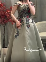 فستان بلون زيتي فاخر مطرز بورود