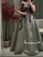 فستان بلون زيتي فاخر مطرز بورود