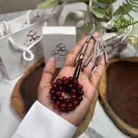 مسباح بكلايت عنابي مكحل كركوشة