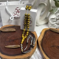 مسباح فاتوران اصفر مكحل كركوشة