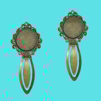 براويز معدنيه 12 حبه