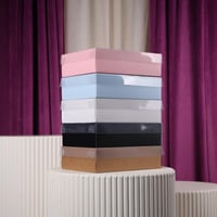 علبة منتجات وسط مستطيل شفاف ابيض درزن