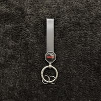 ميداليه بشعار جي ام سي جلد اسود