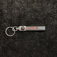 ميداليه بشعار جي ام سي جلد اسود