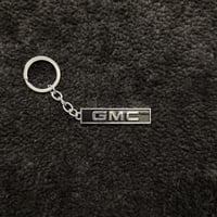 ميداليه بشعار جي ام سي معدن