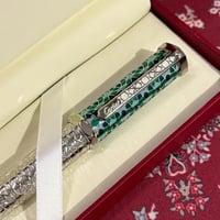 قلم سانتوس مموج اخضر