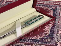 قلم سانتوس مموج اخضر